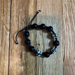 Crystal zebra ball & string adjustable bracelet EUC.